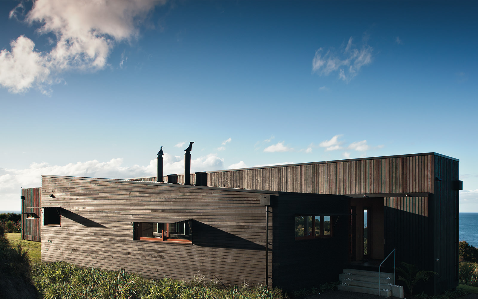 dark timber cladding modern beach house
