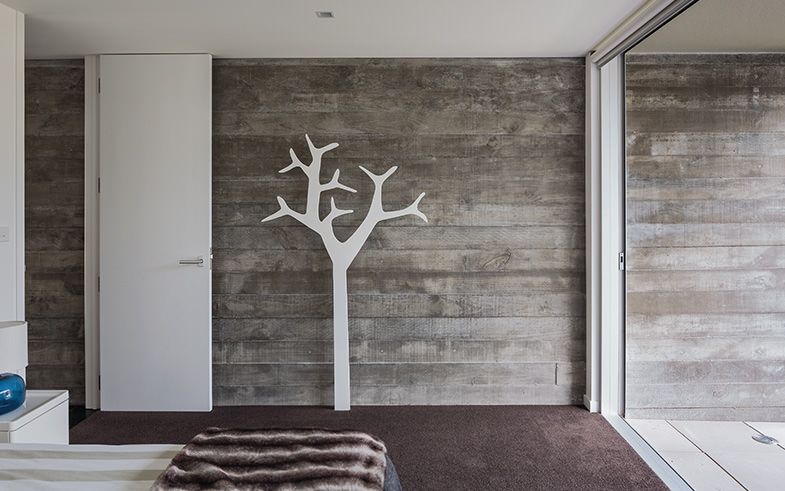 contemporary concrete textured wall bedroom interior