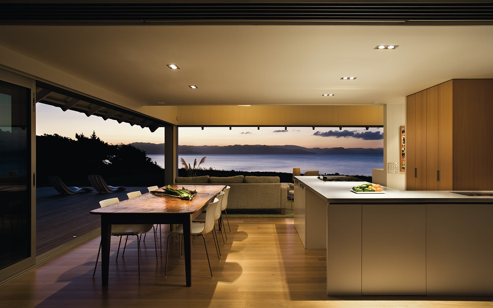 sunset in architectural house by the water