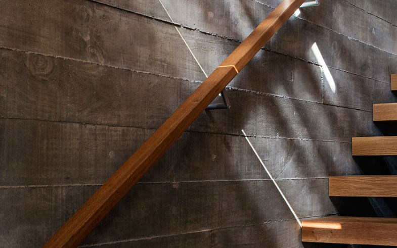 light ray on concrete wall staircase