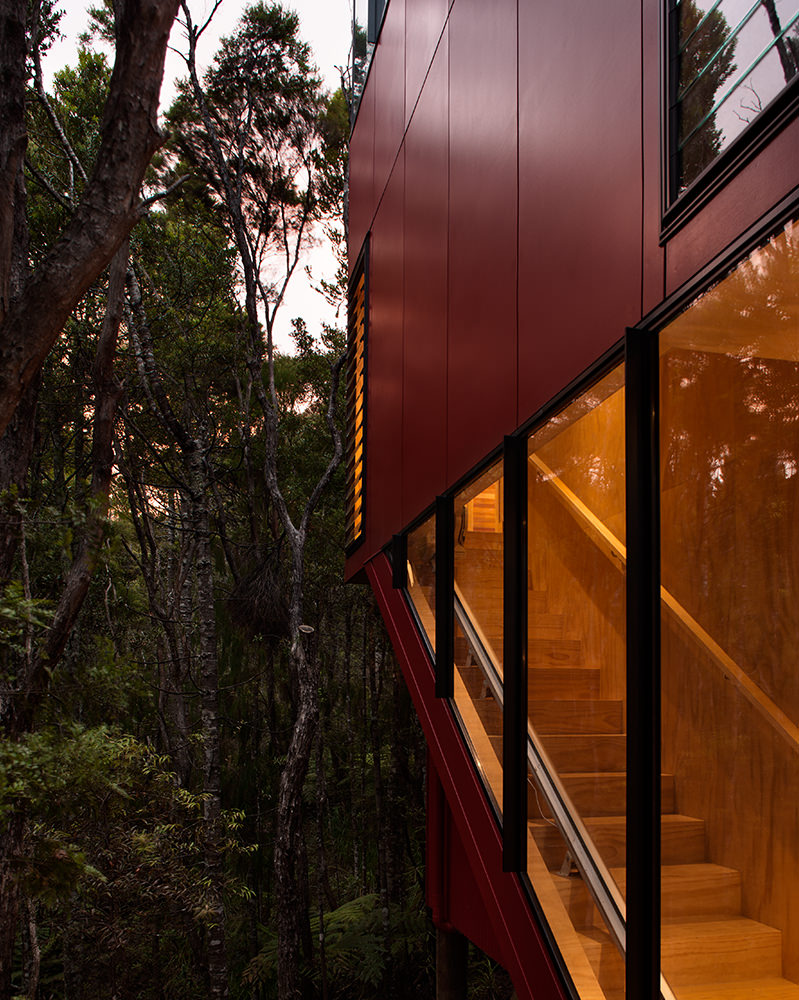 red cladding and glazed timber staircase