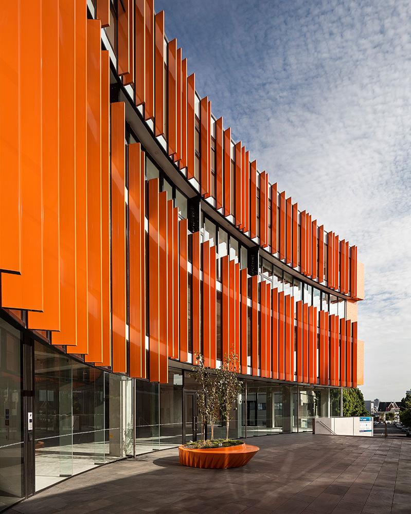 curving architectural orange facade