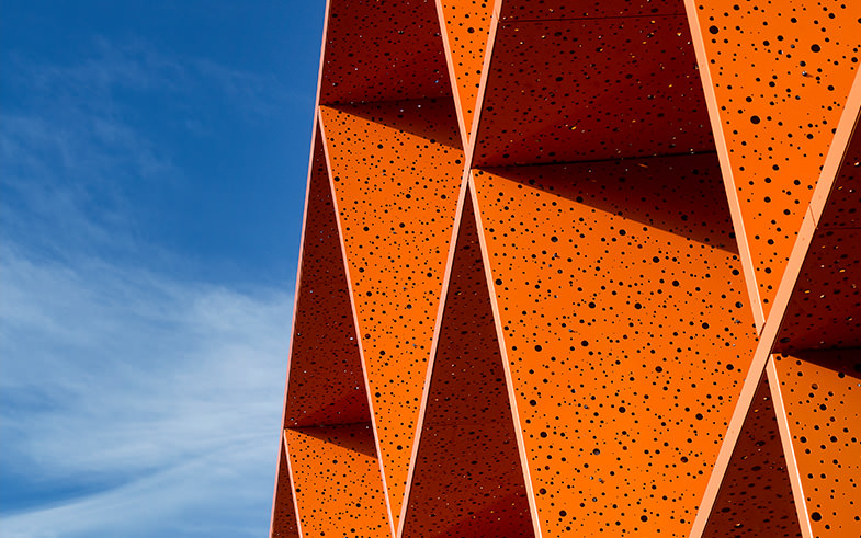 detail of architectural orange textured facade