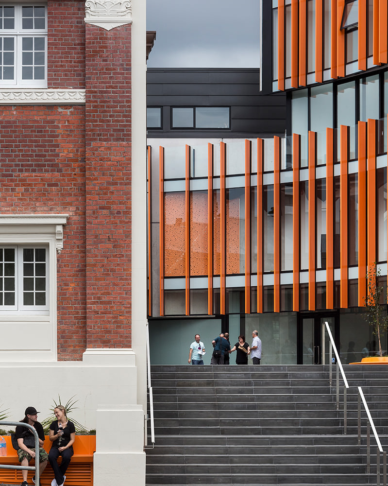 heritage brick and contemporary orange facade