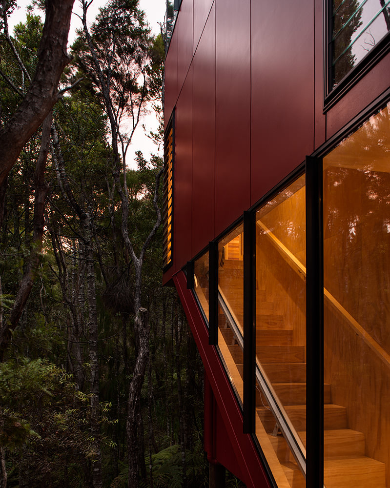 detail of red cladding staircase glazing