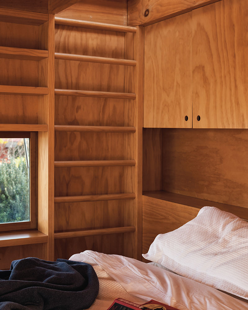 small timber interior ladder in bedroom