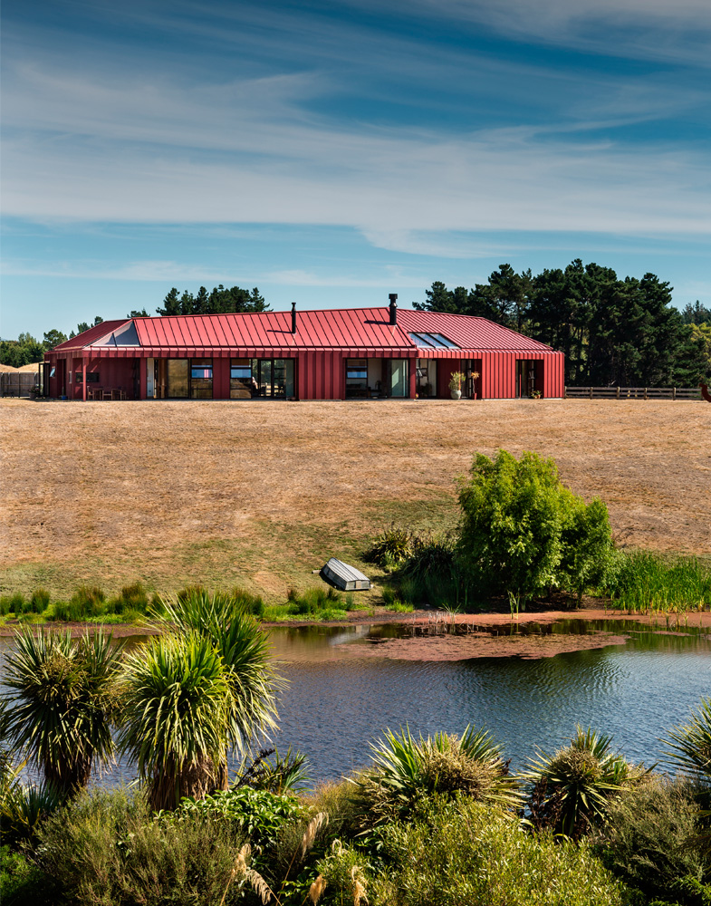 red house by new zealand lake