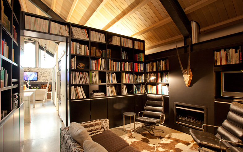 Modern interior library with fireplace