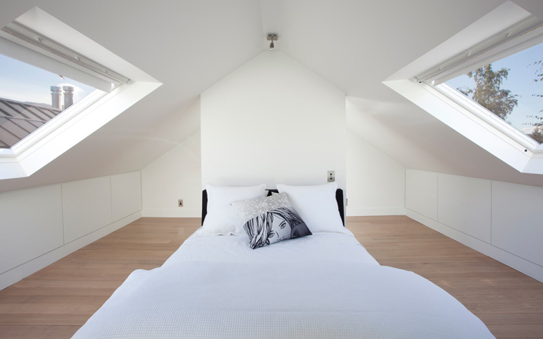 White bedroom interior architectural skylights