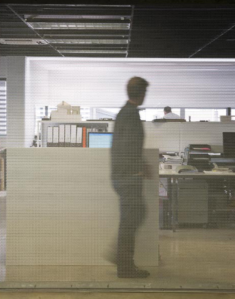 man walking in modern office interior