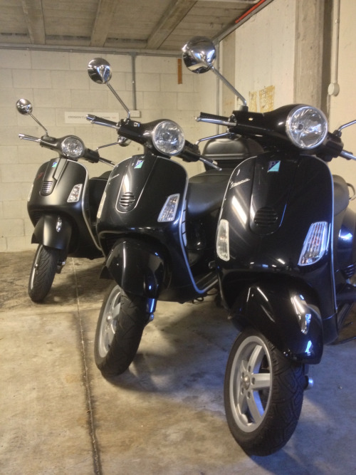 three black vespas