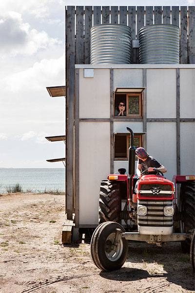 hut on sleds on tracktor