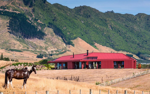 red house with horse