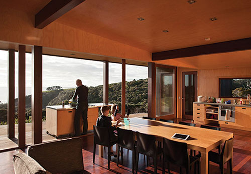 family cooking on verandah